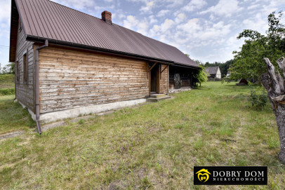Dom 50m2 Poniklica — zdjęcie od frontu