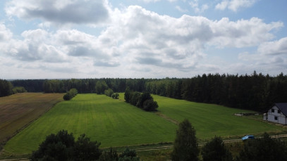 Działka 1050m2 Pomigacze — zdjęcie od frontu